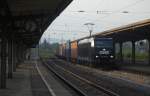 OHE 185 546-9 mit einem Containerzug am 03.08.2011 in Kreiensen