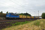 PRESS mit der 140 037-1 und einem Containerzug unterwegs in Richtung Lüneburg.