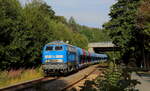 Schotterzug mit der Press 218 057 von Plauen auf dem Weg nach Bad Brambach. Aufgenommen am 26.07.2024 in Oelsnitz /Vogtl. 