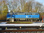 In Putbus stand,am 23.November 2024,die PRESS 218 057 die mehrere Schotterwagen nach Putbus brachte.