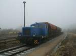 PRESS 312 002,am 17.Mrz 2012,mit einem  kleinen  Gterzug auf dem Tankgleis in Putbus.