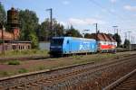 Mit einem GZ am Haken kam die 145 030-7  Rasender Roland  von der Pressnitztalbahn am 12.08.2012 durch Grokorbetha