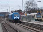 PRESS 253 015 auf Gleis 2,am 08.April 2015,in Bergen/Rügen.PRESS VT650 032 erhielt vor 253 015 bei der Ausfahrt nach Putbus Vorrang.