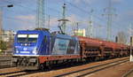 Raildox 187 317-3 mit dem Düngerzug am 13.02.18 Bf. Flughafen Berlin-Schönefeld.