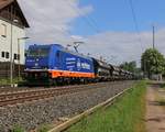 Raildox 185 409-0 mit Schüttgutwagen-Ganzzug in Fahrtrichtung Süden.