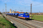 185 409 Raildox mit einem Kalizug bei Herrnberchtheim Richtung Ansbach, 31.03.2021