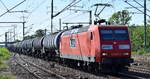 RBH Logistics GmbH, Gladbeck [D] mit der  145 007-1   [NVR-Nummer: 91 80 6145 007-1 D-DB] und einem Kesselwagenzug am 09.09.23 Höhe Bahnhof Flughafen BER Terminal 5.