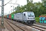 Rheincargo 187 074-0 in Hamburg Harburg am 16.07.19 vom Bahnsteig aus fotografiert