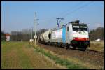 Mit einem Getreidezug fhrt die von Railpool gemietete 186 107 der Ruhrtalbahn Cargo am 24.03.2012 auf der Verbindungskurve von Rderau nach Zeithain Bogendreieck.