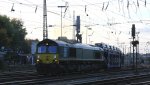 Die Class 66 PB01 von der Rurtalbahn-Cargo fhrt mit einem sehr langen Ford-Autozug von Aachen-West nach Belgien in der Abendstimmung am 9.10.2012.