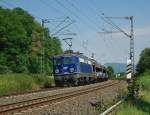 1142 562-6 legt sich vor Wehretal Reichensachsen mit ihrem Autozug in Richtung Sden in die Kurve. Aufgenommen am 07.08.2010.