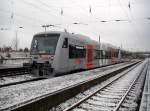 Die gleiche Zuggarnitur in Fahrtrichtung Leipzig wartet auf das Abfahrtsignal,im Vordergrund Gleis 1 im Bahnhof Eilenburg/Ost wird offensichtlich nicht benutzt,13.12.2009