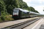 MRCE-Dispolok ER20-014 mit einem Reisezug der NOB unterwegs nach Westerland bei der Durchfahrt Bahnhof Meldorf.09.07.09.