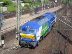 MaK DE 2700-09 der Nord-Ostsee Bahn (NOB) steht am 12.07.2005 im nrdlichen Gleisvorfeld von Hamburg Hbf. Die Lok trgt die Werbe-Aufschrift  Vossloh-Technik auf der Marschbahn ab Dezember 2005 . Laut Eisenbahn Kurier 06/2005 sollen diese Loks als Zwischenlsung bis 2007 die Zge auf der Marschbahn zwischen Hamburg und Westerland auf Sylt bespannen. 