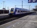 Steuerwagen voraus und geschoben von Dispolok ER20-011 gehts von Westerland nach Hamburg Altona.Hier bei der Einfahrt in den Bahnhof Itzehohe.08.03.2011.