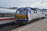 HAMBURG, 11.09.2011, Diesellok MaK DE 2700-12 der Nord-Ostsee Bahn vor einem Regionalzug nach Westerland Sylt im Bahnhof Hamburg-Altona