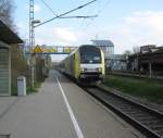 ER 20-001 mit der Nord-Ostsee-Bahn von Hamburg-Altona nach Westerland (Sylt) bei der Durchfahrt durch den Bahnhof Tornesch am 18.04.2012