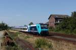 Die Zukunft auf der Marschbahn in grässlichem Design: 245 201-9 als NOB 81723 nach Hamburg-Altona kurz vor der Klappbrücke in Husum.