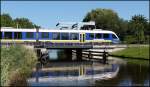 Lint 41 der Nord West Bahn beim berqueren des Ems-Jade-Kanal´s auf dem weg von Esens nach Wilhelmshaven.06/09/2013