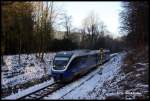 Nord West Bahn VT 643312 überquert am 4.2.2015 um 9.58 Uhr auf der Fahrt nach Bielefeld den Teutoburger Wald bei Hilter.