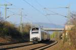 Umgedreht... schon der nchste... 460 010-2 der Sonne und Mainz Hbf entgegen. (April 2009)