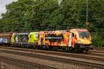 182 572  Wir brennen für das was wir tun  TXL/MRCE mit TXL 193 556 in Köln West, am 27.05.2018.