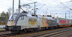 TXL - TX Logistik AG mit dem MRCE Kaiser Franz Taurus   ES 64 U2-023    [NVR-Number: 91 80 6182 523-1 D-DISPO] und KLV-Zug beim Kurzhalt Bf.