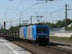 185 512 und eine Schwesterlok ziehen einen Autozug am 13.9.07 durch Olching