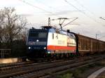 TXL 185 513-9 mit Werbung Rostock Port bei der Einfahrt in Halle/ Saale .01.05.08