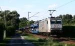 Auf dem Weg nach Weil am Rhein ist die von TX Logistics eingesetzte 185 539, die den Fordzug von Dillingen am 10.07.08 in den Gterbahnhof von Karlsruhe zieht.