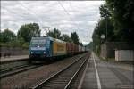 Der nchste Morgen war nicht wirklich schn als 185 518  Transped  mit einem DGS vom Brenner zur Ostseekste den Bahnhof Kiefersfelden durchfhrt.