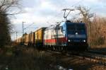 Die TX Logistik Lok 185 513 „Rostock Port“ mit dem Transped Zug am 2.12.2008 in Haar (bei Mnchen).