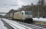 Die einzige, die am 13.02.2010 in Eichenberg ein ganz klein Bichen Sonne abbekommen hat war 185 531-1 der TXLogistik in Fahrtrichtung Norden.