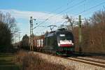 182 598 von TX Logistik mit einem Stahlzug am 16.01.2010 in Haar.