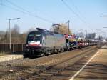 ES 64 029 am 24.02.2011 mit einem BMW-Zug in Regensburg-Prfening 