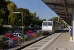 TX Logistik 185 537 rauscht durch Oberschleißheim in Richtung München.