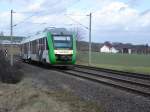 Ein Vectus-zug mit dem Resieziel  Wiesbaden Hbf  hat soeben den Bahnhof Bad Camberg verlassen.