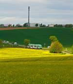 Der VT 268 der vectus (ein Alstom Coradia LINT 41) fhrt am 10.05.2013 ber den Oberwesterwald (KBS 461), hier kurz vor Hachenburg.
Er fhrt als RB 28 die Strecke Au/Sieg-Altenkirchen-Hachenburg-Westerburg-Limburg/Lahn