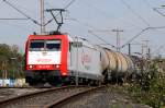 185-CL 007 hat mit einem Kesselwagenzug den Hafen von Duisburg-Ruhrort erreicht.