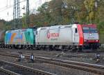 Eine bunte Doppeltraktion vor einem Kesselzug , angefhrt von VEOLIA´s 185-CL-005, aufgenommen in Gremberg am 14.10.09