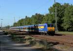 Sommerzeit-Urlaubszeit, mit Werbung fr die Urlaubsorte an der Nordsee durchfhrt gerade der InterConnex X 68904 von Warnemnde nach Leipzig den Bf Nassenheide.