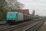 Traxx 185 615-2 (Baujahr: 2009) der Verkehrsbetriebe Peine-Salzgitter GmbH mit einem Stahlzug in die Richtung Rheine auf Bahnhof Ibbenbüren am 6-11-2015.