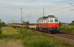 Mit einem leeren Flachwagenzug rollte 232 141 der WFL am Abend des 23.09.19 durch Gräfenhainichen Richtung Bitterfeld.