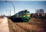 WAB-Lok 27 mit einem Kieszug auf der Ladestrae von Bergen/Rgen im Mai 2003.