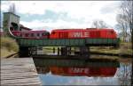 Lok 23 der WLE mit Sonderzug beim berqueren des Ems-Jade-Kanal komment von Wilhelmshaven.