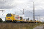 264 011 WIEBE Voith Maxima mit einem Bauzug in Dedensen Gümmer, am 05.10.2016.