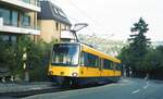 SSB Zahnradbahn__Zeitenwende an der Haltestelle 'Pfaffenweg'. Dieselbe Stelle 1983 mit ZT4.1 [MAN/SLM/AEG 1982] 1001 im originalen Livrée SCHWARZ-Gelb.__1983