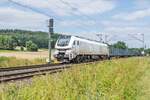 159 206-2 mit einen leeren Holzzug am 21.07.2021 gesehen bei Kerzell