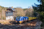 Raildox 159 233 mit leerem Holzzug nach Saalfeld am 12.02.2022 in Lobenstein Süd.