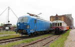 SKL 248 023 neben dem DR 195 603-6 Bwiq (ex DR VS 145 014), am 06.05.2023 beim Familienfest der Magdeburger Eisenbahnfreunde im Wissenschaftshafen Magdeburg.